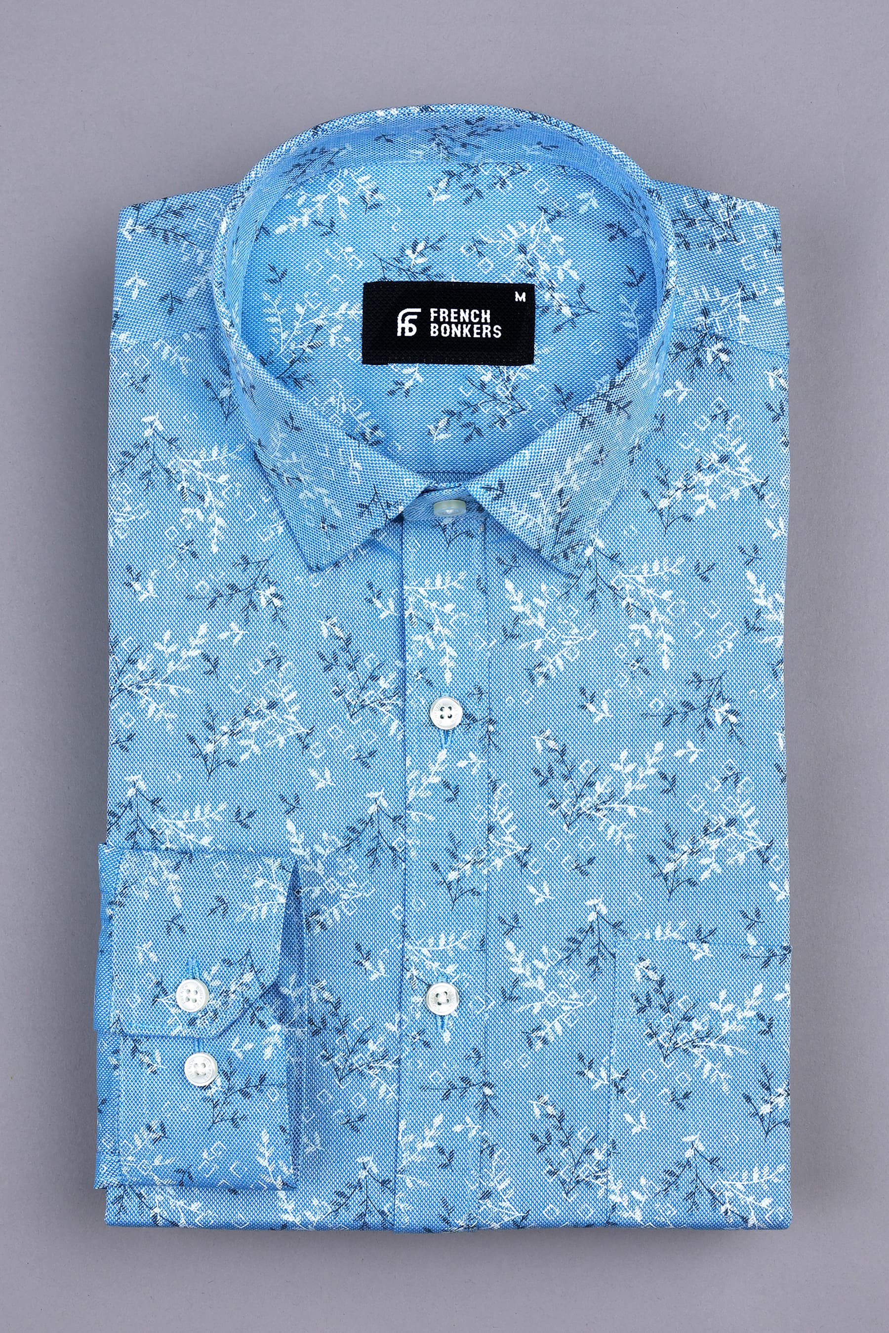 Aqua blue with black and white printed shirt