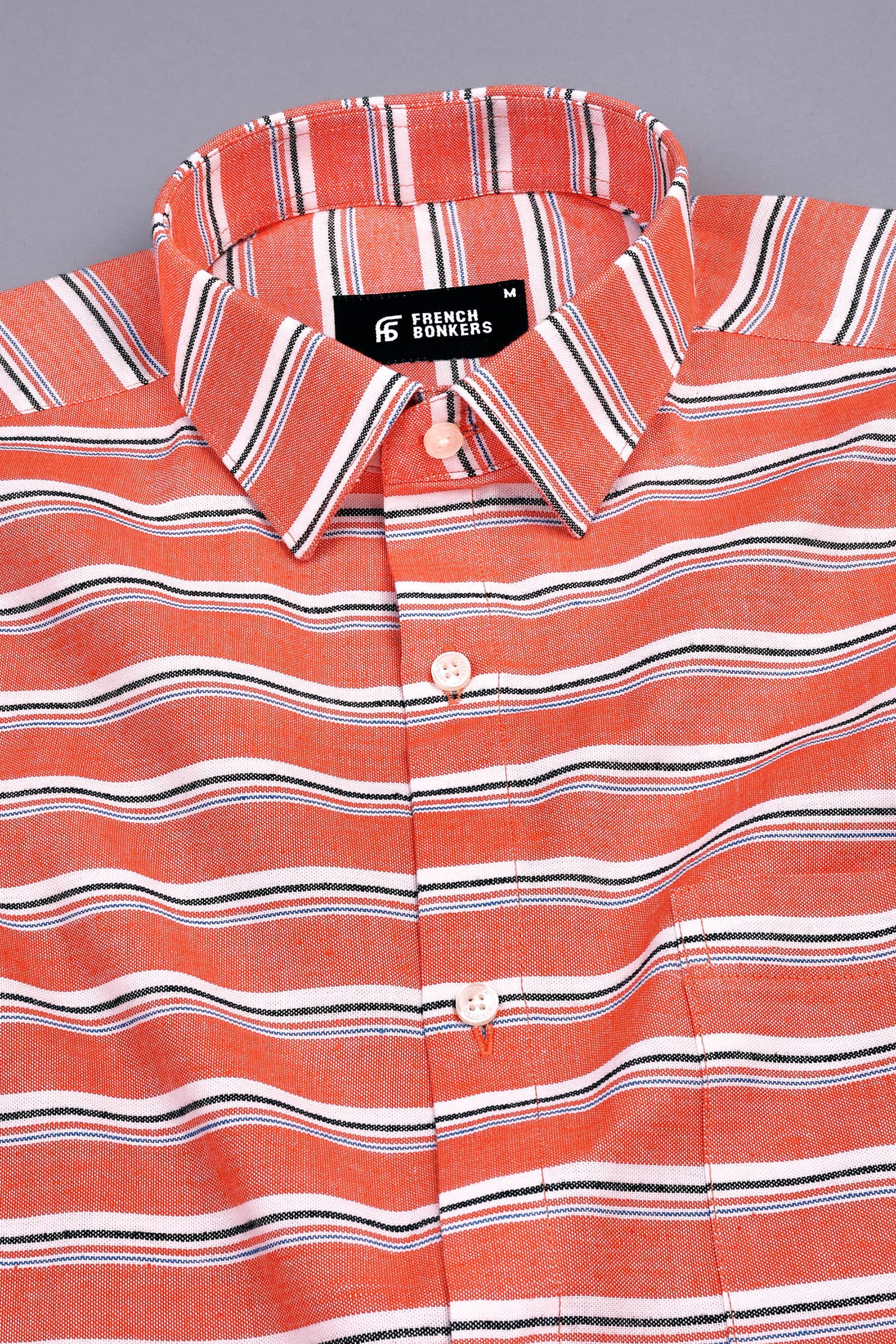 Tangerine orange with blue black and white aradonis stripe shirt
