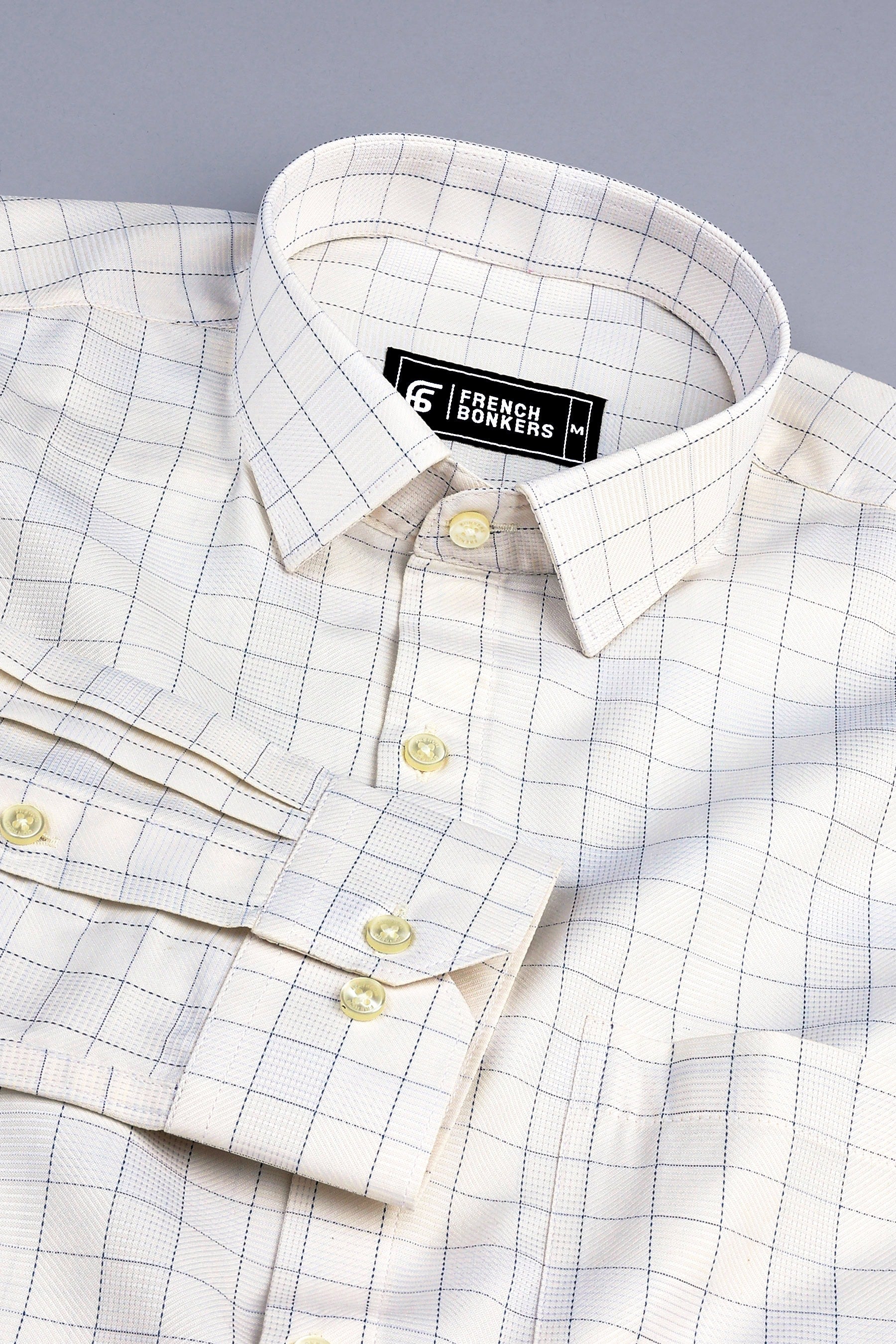 Light brown with dark blue arglye check shirt