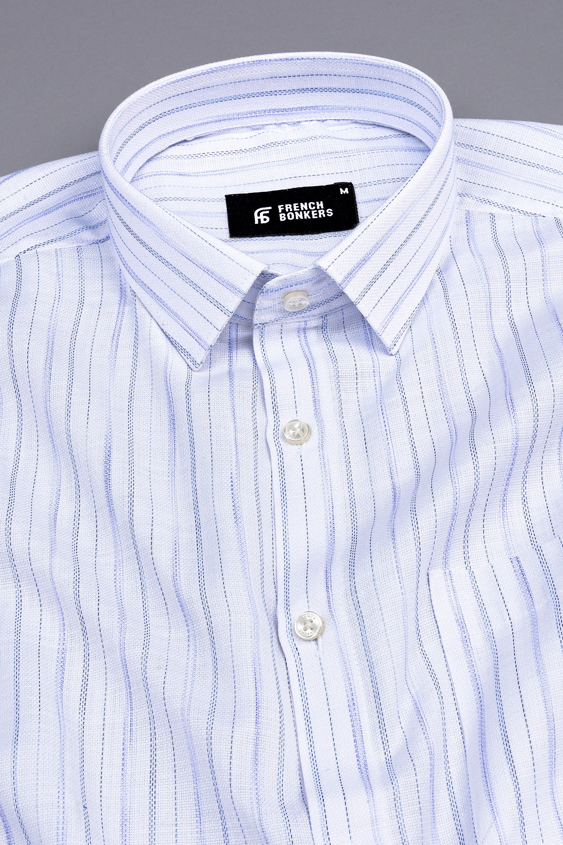 Rich white with royal blue lines arglye stripe shirt